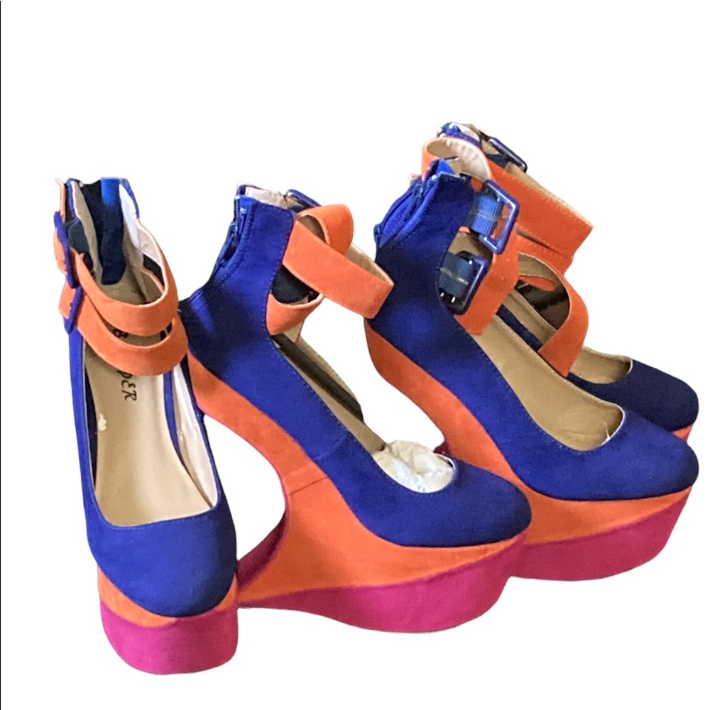 Bundle of two identical pair of wedge heels as pictured